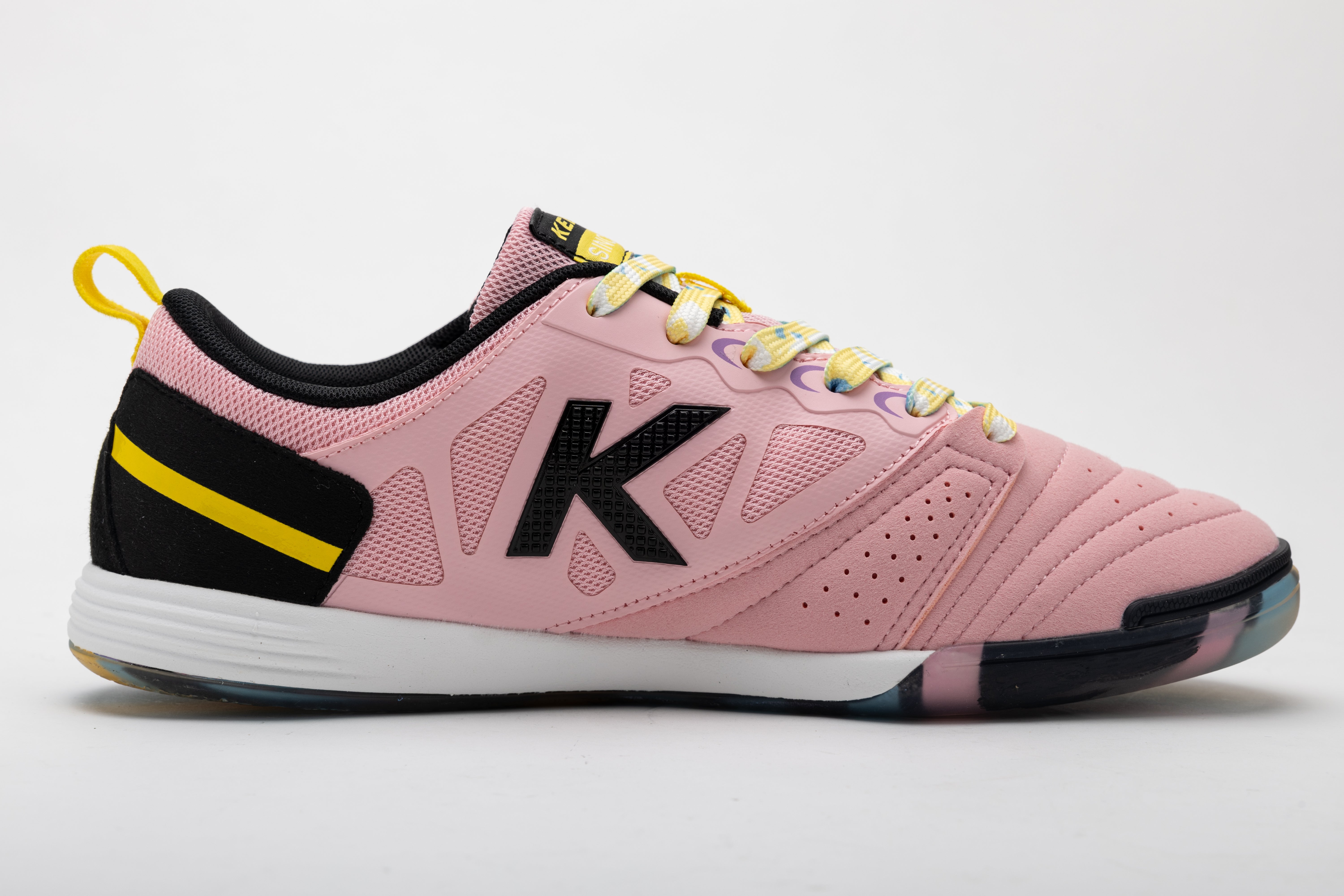 Kelme men's futsal shoes in pink with black heel and yellow logo stripe