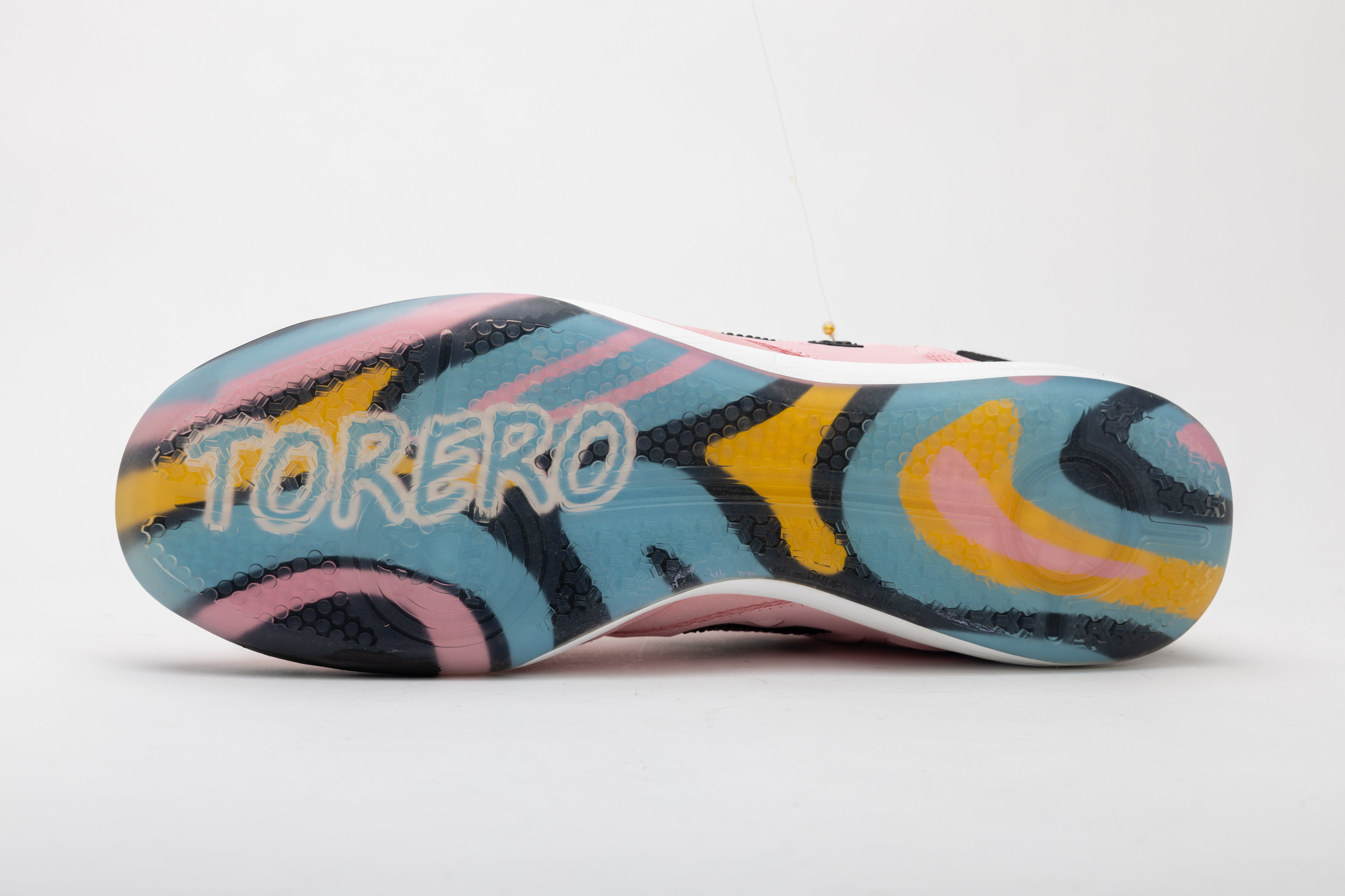 Kelme men's futsal shoe outsole with colorful graphic tread