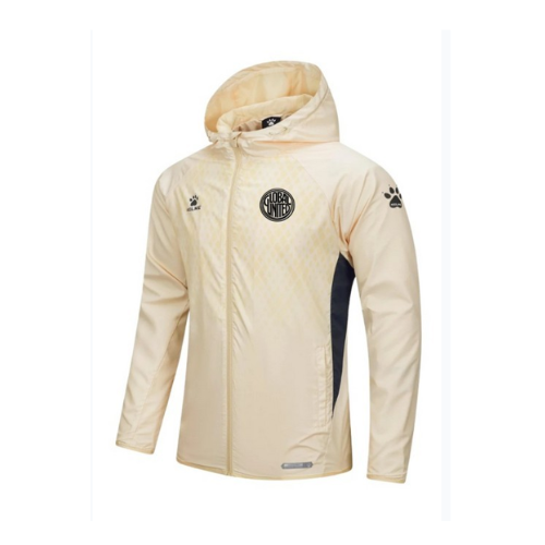 Light cream hooded zip-up training jacket with team crest on chest and sleeve logo