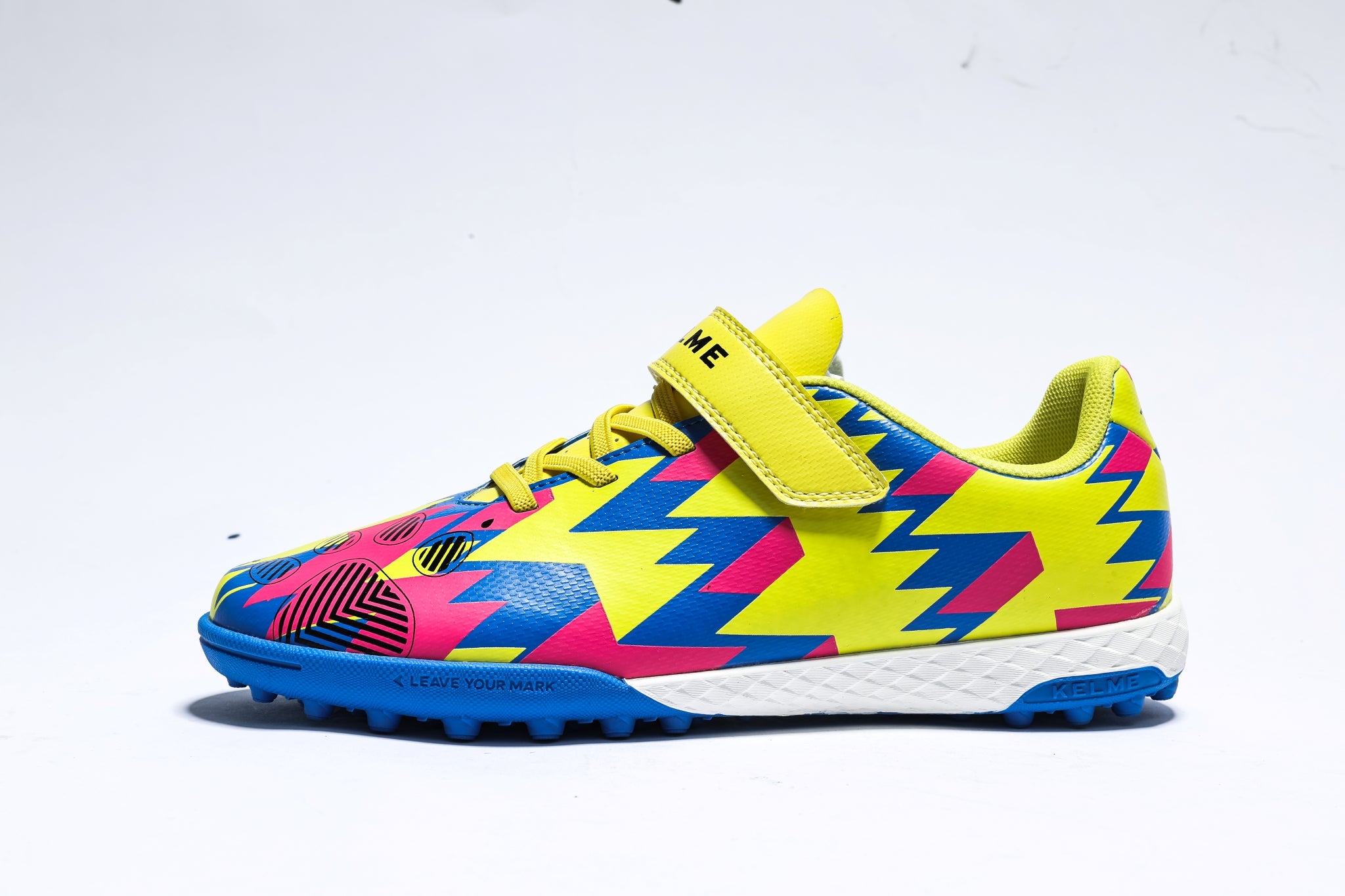 Kelme Soccer Shoes (TF) | Synthetic Upper, Velcro Strap & PU